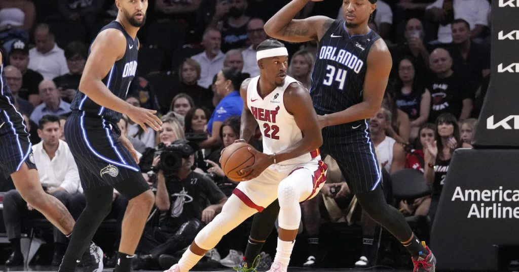 Magic roll past host Heat 116-97 in season opener