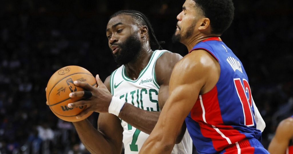 Tatum scores 37 points and Celtics hold to beat stubborn Pistons 124-118