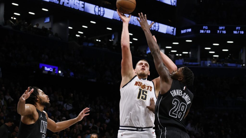 Jokic has 29 points, 18 rebounds and 16 assists to lead Nuggets past Nets 144-139 in OT